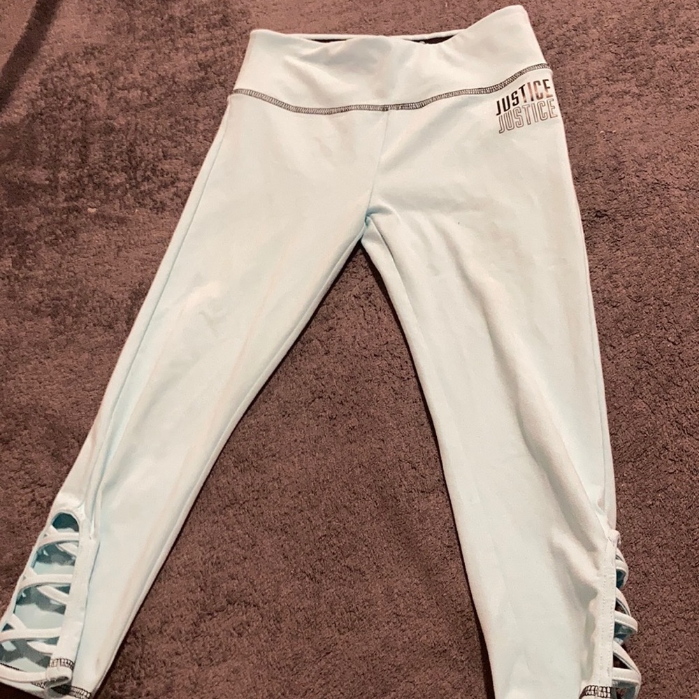 I am selling these blue Capri leggings. They have a cute design on the bottom.
